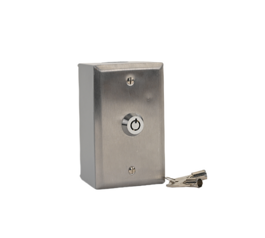 A brushed stainless steel faceplate key switch with a cylindrical key switch and a center-return mechanism.